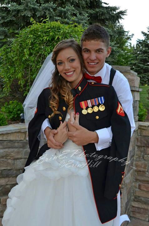 Wedding picture with her Marine's jacket on_ A little too cutesy for me, but sweet photo nonetheless_ Wedding picture with her Marine's jacket on_ A little too cutesy for me, but sweet photo nonetheless_